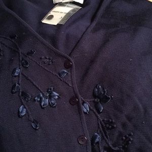 Navy blue long sleeved cardigan.